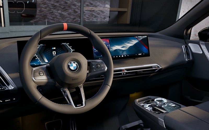 Interior steering wheel and dashboard of the BMW iX M70. | BMW of Roxbury in Kenvil NJ